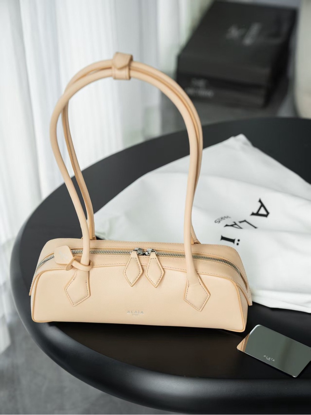 Alaia Soft Peach Barrel Shoulder Bag with Knotted Handles